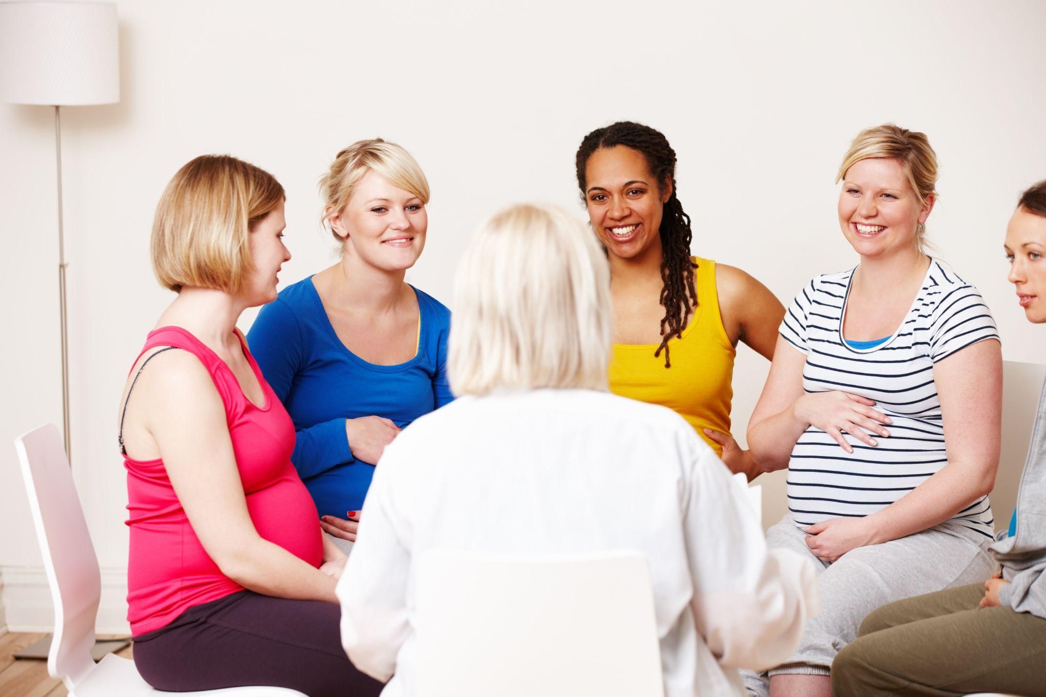 Expectant parents participating in an antenatal class.