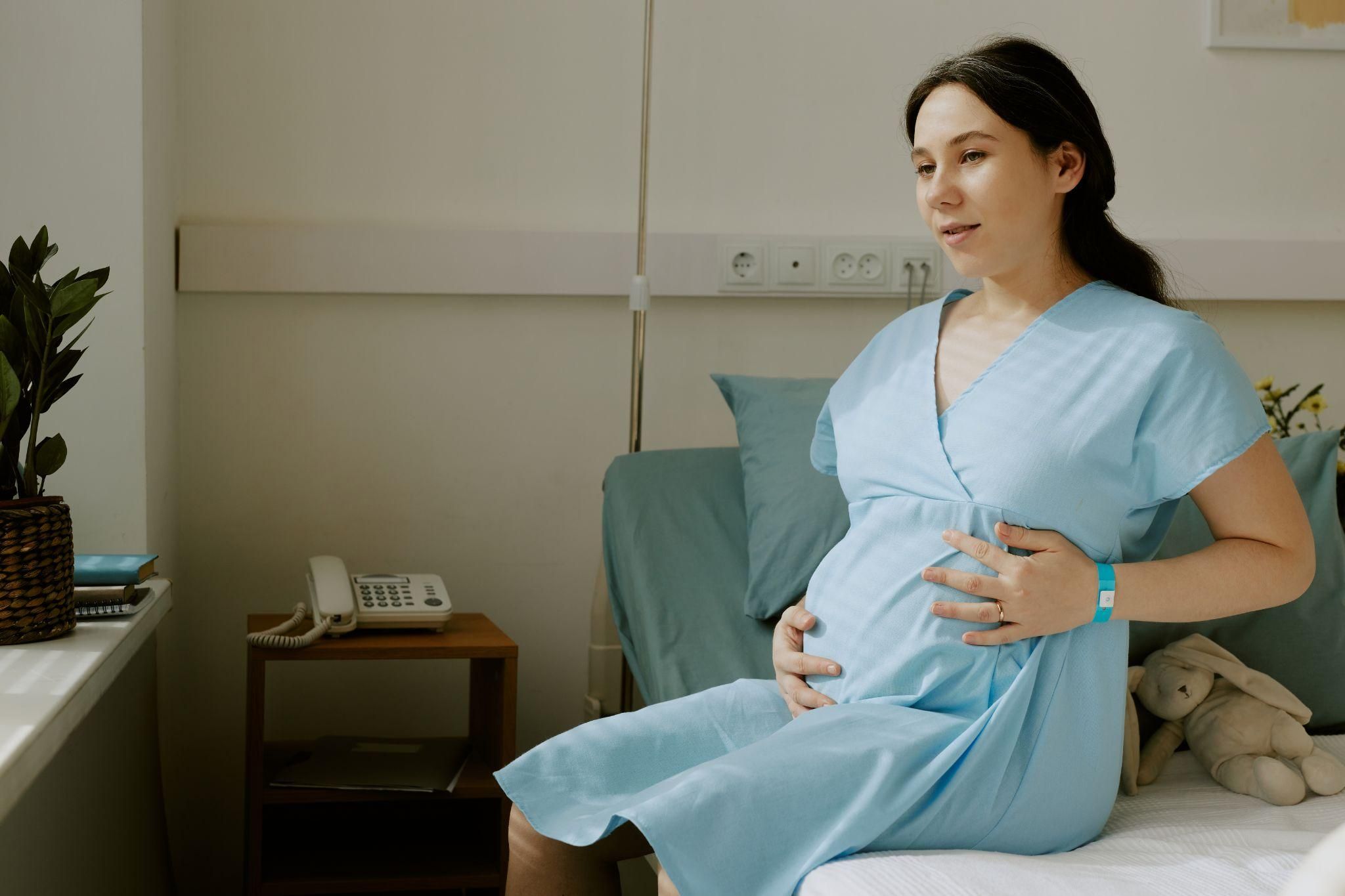 Expectant mother practicing breathing techniques in preparation for labour.