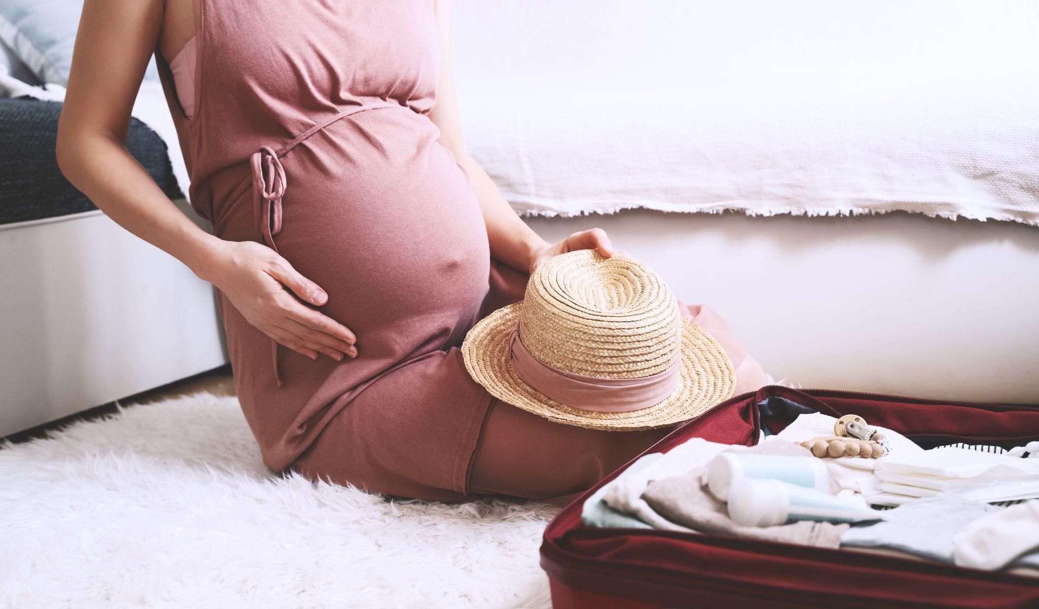 A mum-to-be tracking her baby’s movements while resting at home.