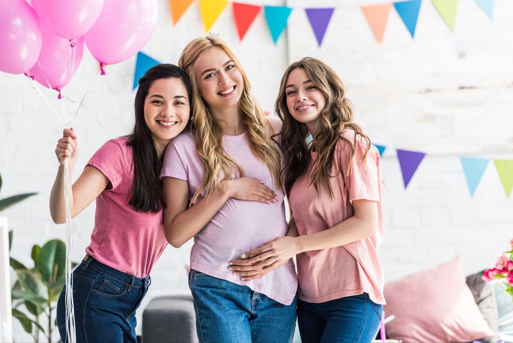 Pregnant woman with her family providing antenatal support.