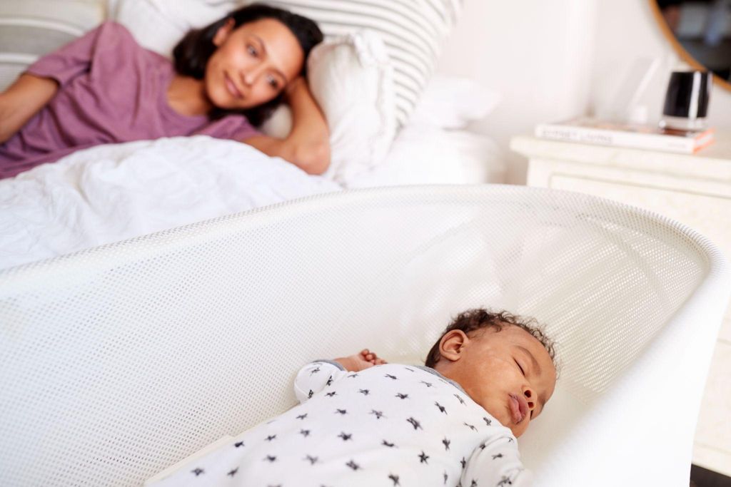 A nursery featuring a co-sleeper and cot bed for comparison.