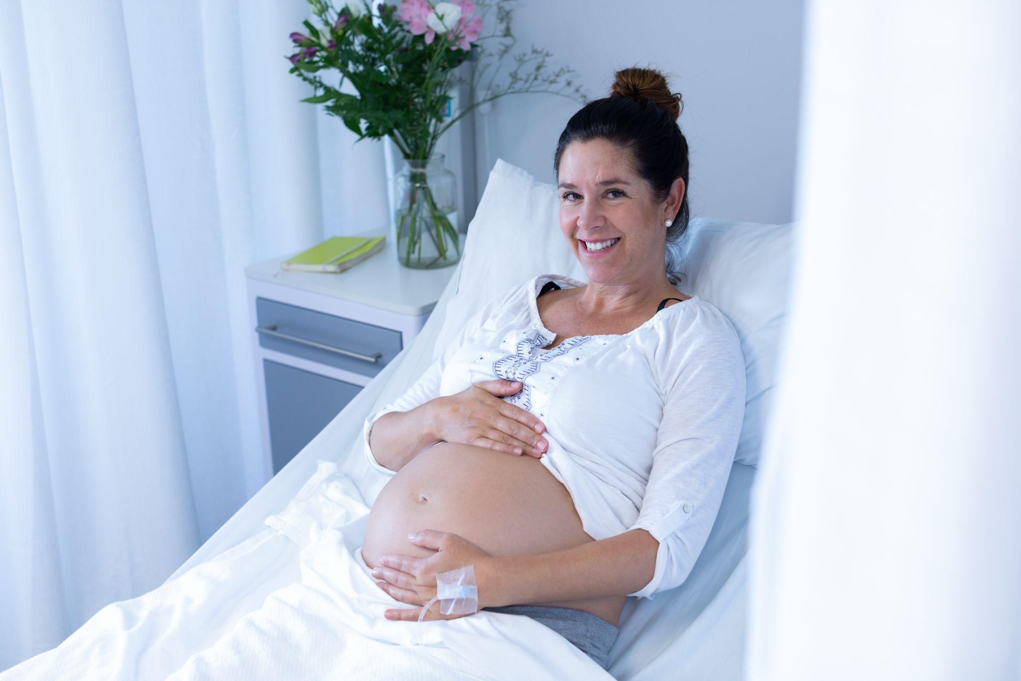 A mother in labour with midwife support at a birth centre in London.