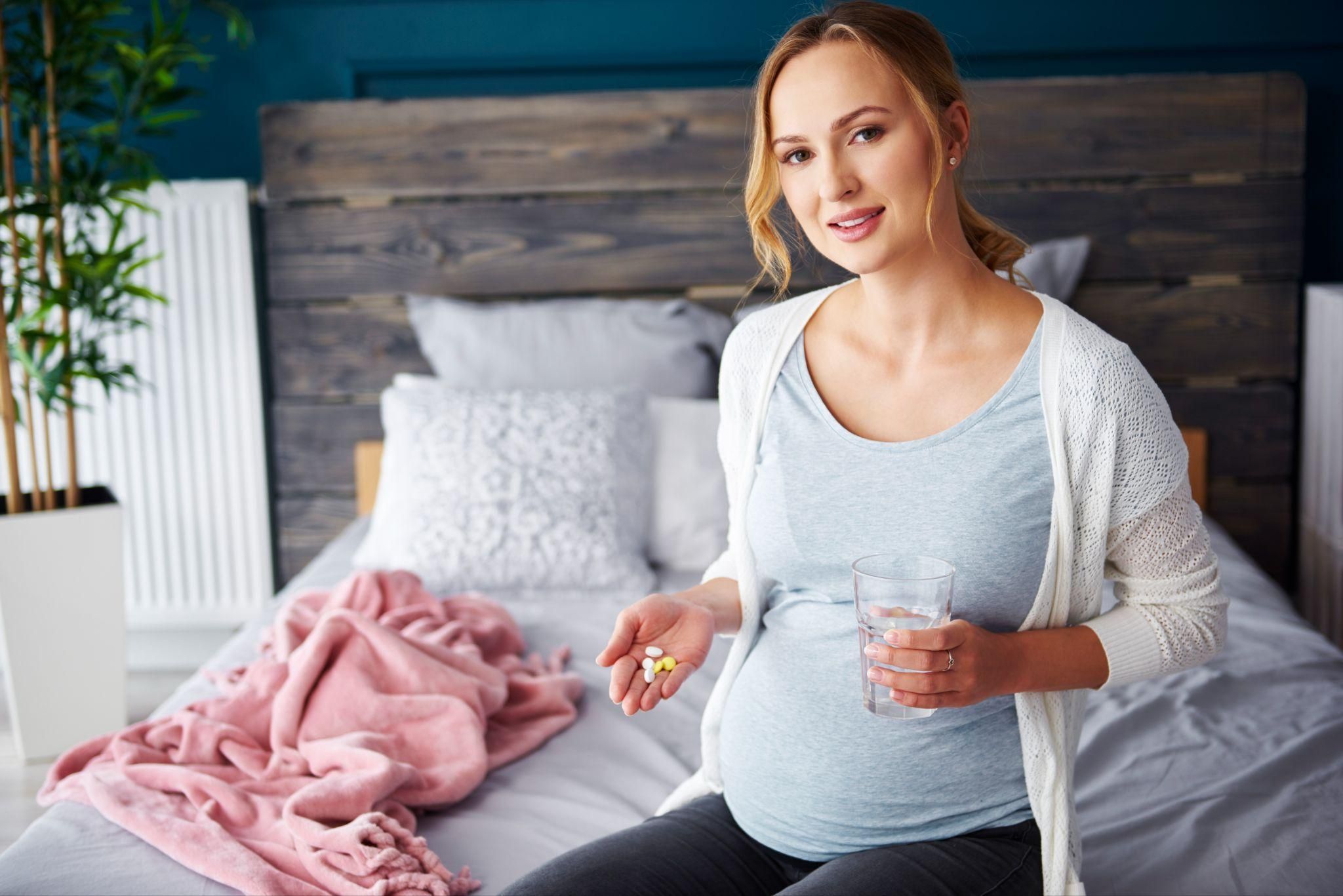 Pregnant woman considering melatonin as a sleep aid.