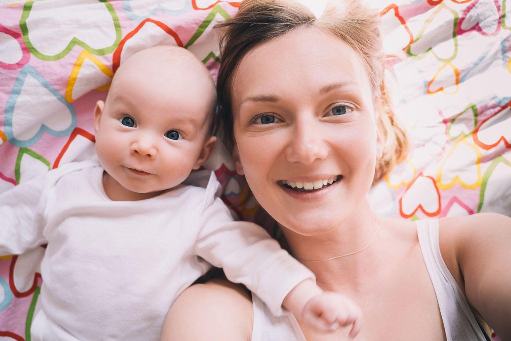 A mother practising self-care during postpartum recovery.