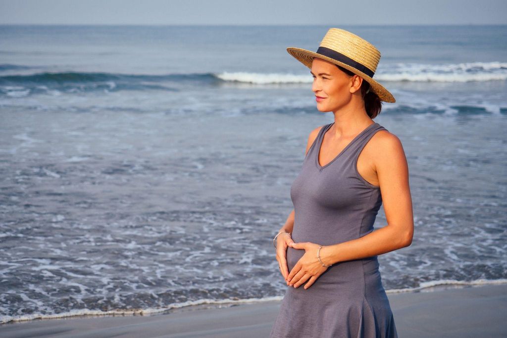 A pregnant woman practising mindfulness to manage symptoms.