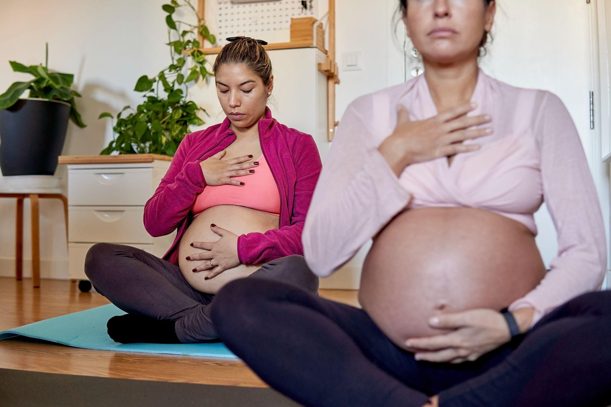 Pregnant woman attending antenatal yoga class at 32 weeks pregnant.