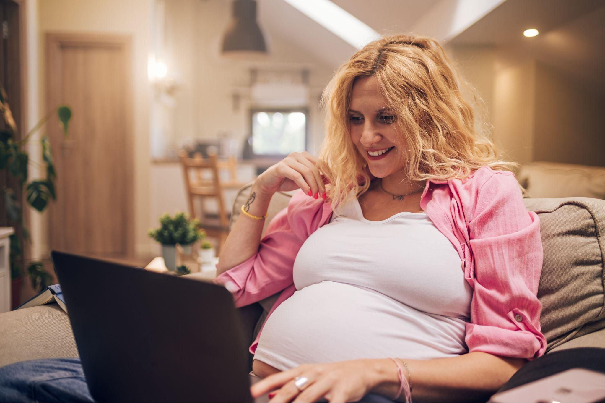 A happy family using BabyCentre’s online tools for antenatal and parenting support.