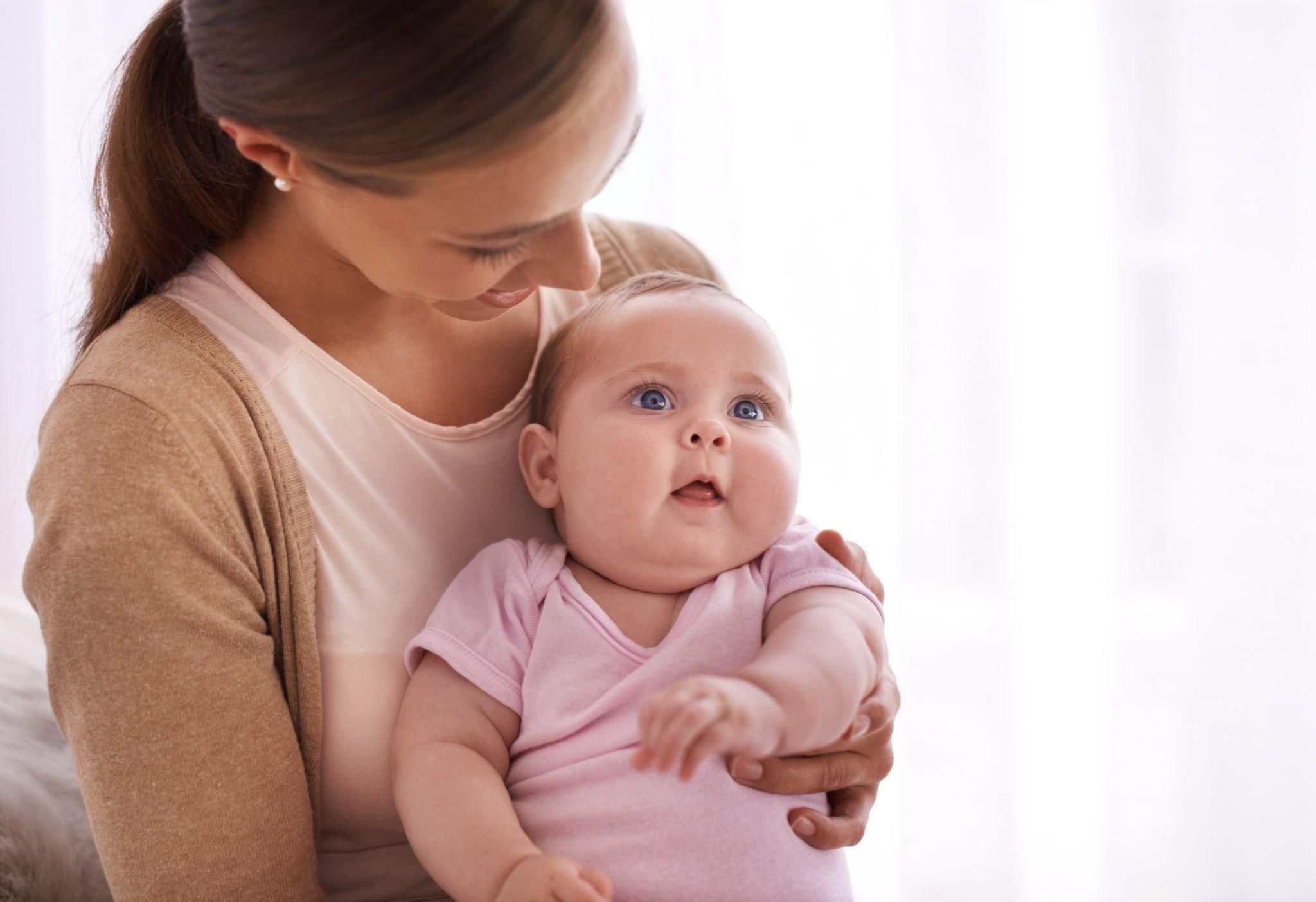 A confident new mum bonding with her newborn.