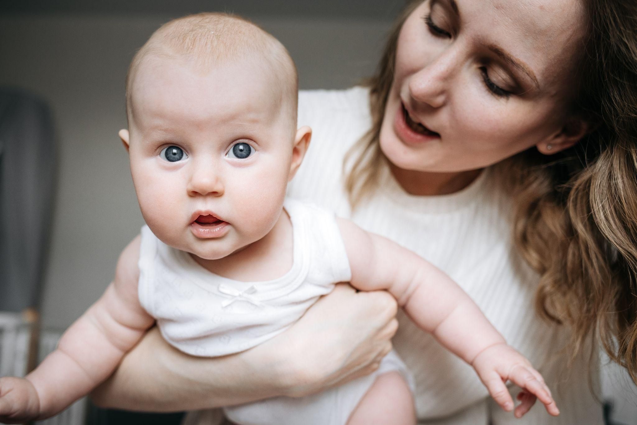 A confident new mum bonding with her baby.