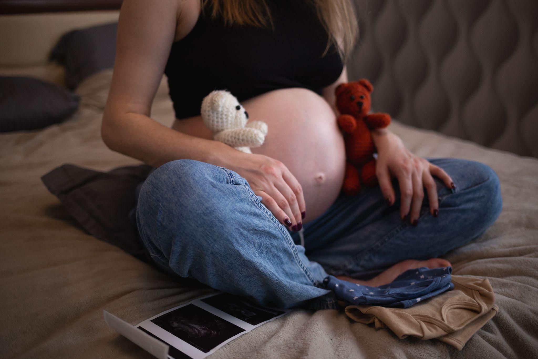 An expectant couple engaging in antenatal education.