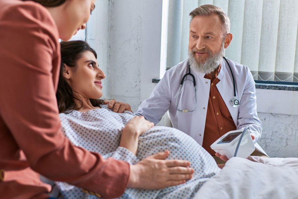 A pregnant woman attending an NHS antenatal appointment.