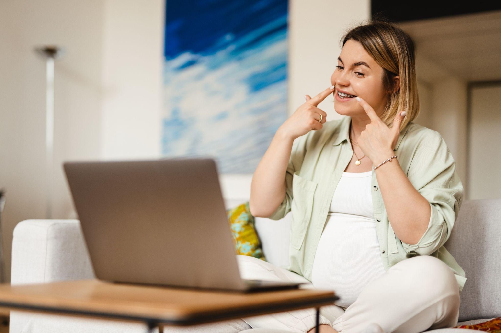 Pregnant woman and partner attending a local antenatal class for first-time parents.