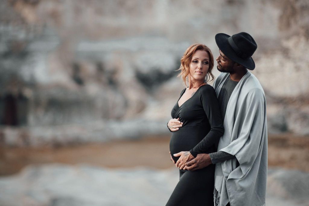 Pregnant women in a yoga class focused on relaxation and mindfulness.