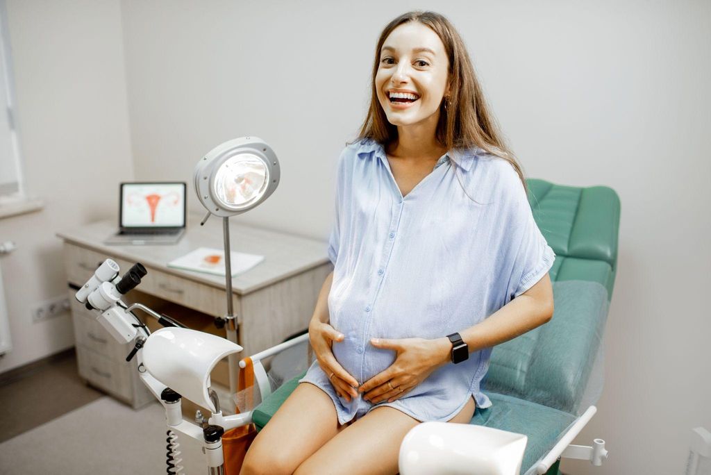 A first-time mum receiving antenatal guidance at an NHS clinic.