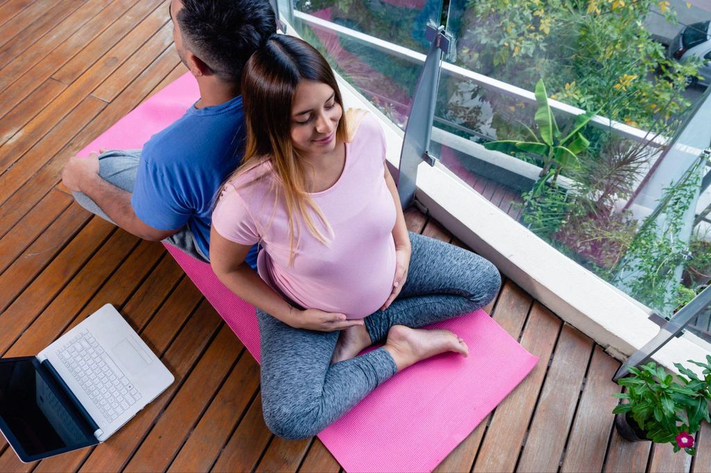 Expectant parents participating in a group antenatal class.