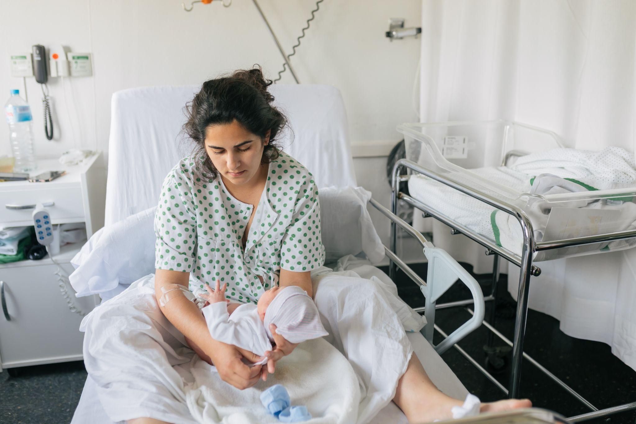 A newborn baby experiencing skin-to-skin contact with the mother, illustrating the eight-minute rule for bonding.