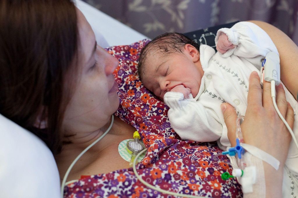 A midwife used a Kiwi Cup to assist a mother during delivery.