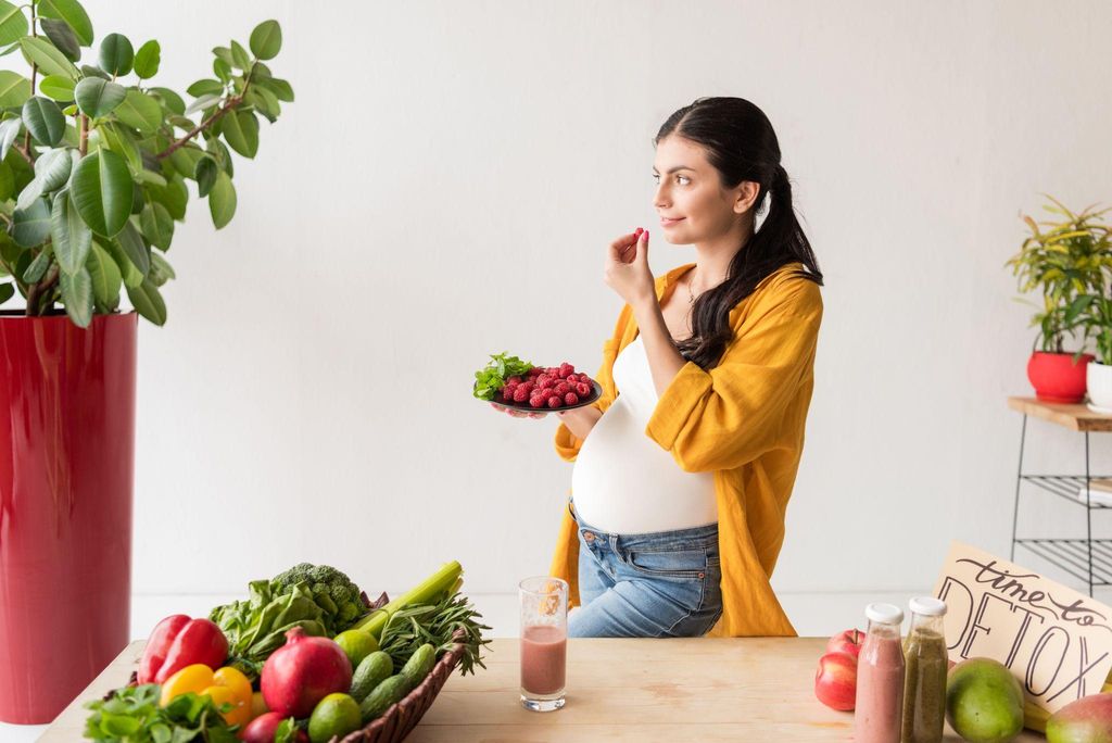 A balanced meal designed for prenatal nutrition, featuring salmon, greens, and quinoa.