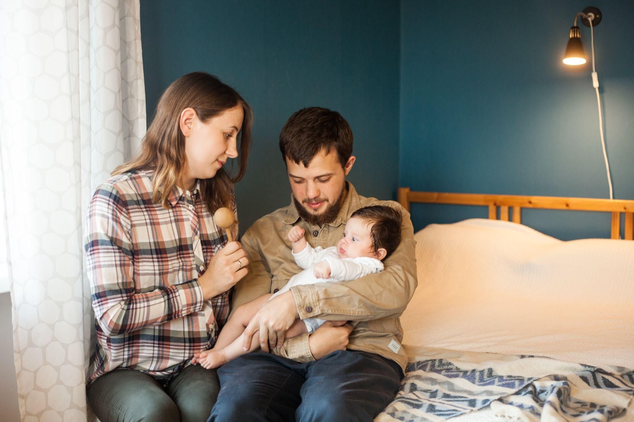 A supportive couple attending an antenatal class together, preparing for the arrival of their baby.