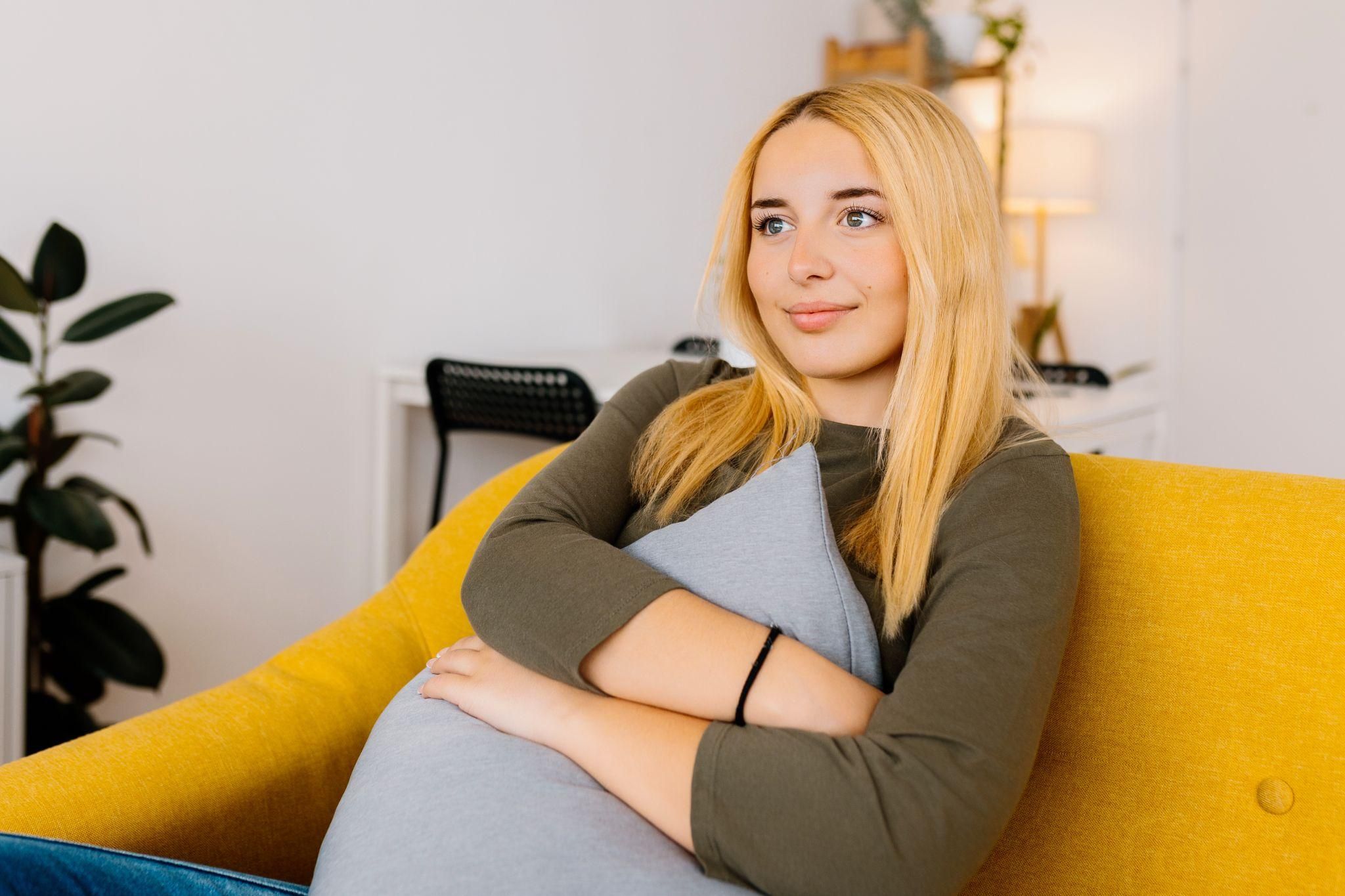 Teenage parent receiving guidance during an antenatal session.