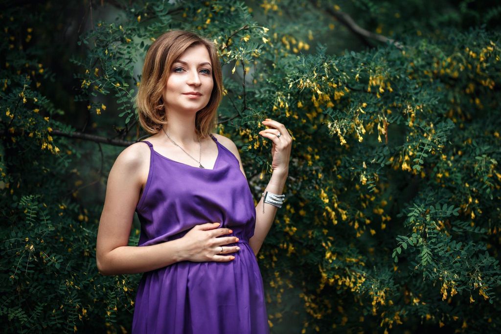 A pregnant woman discussing her antidepressant medication with a doctor.