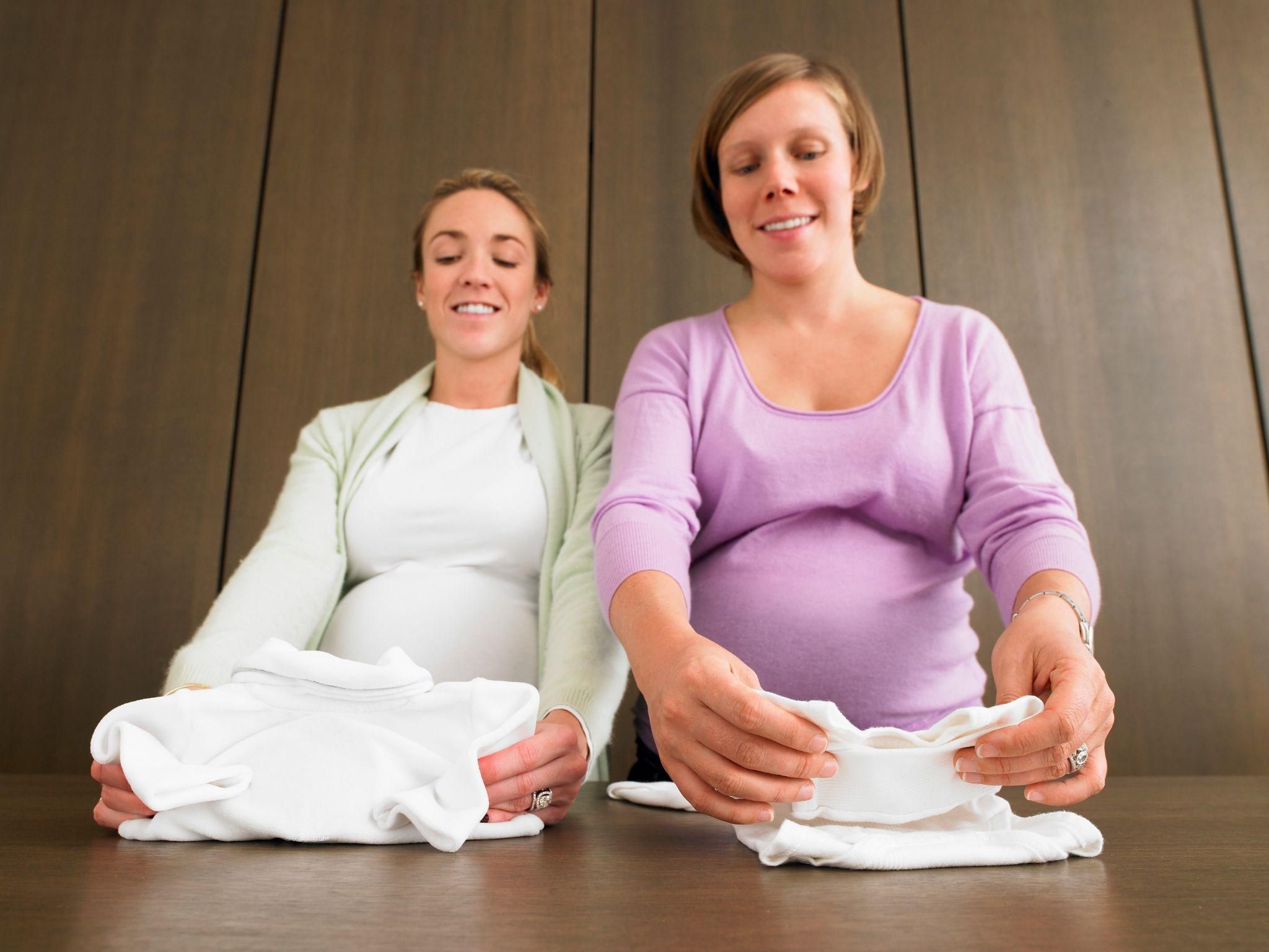 Couples engaging in interactive antenatal class activities.