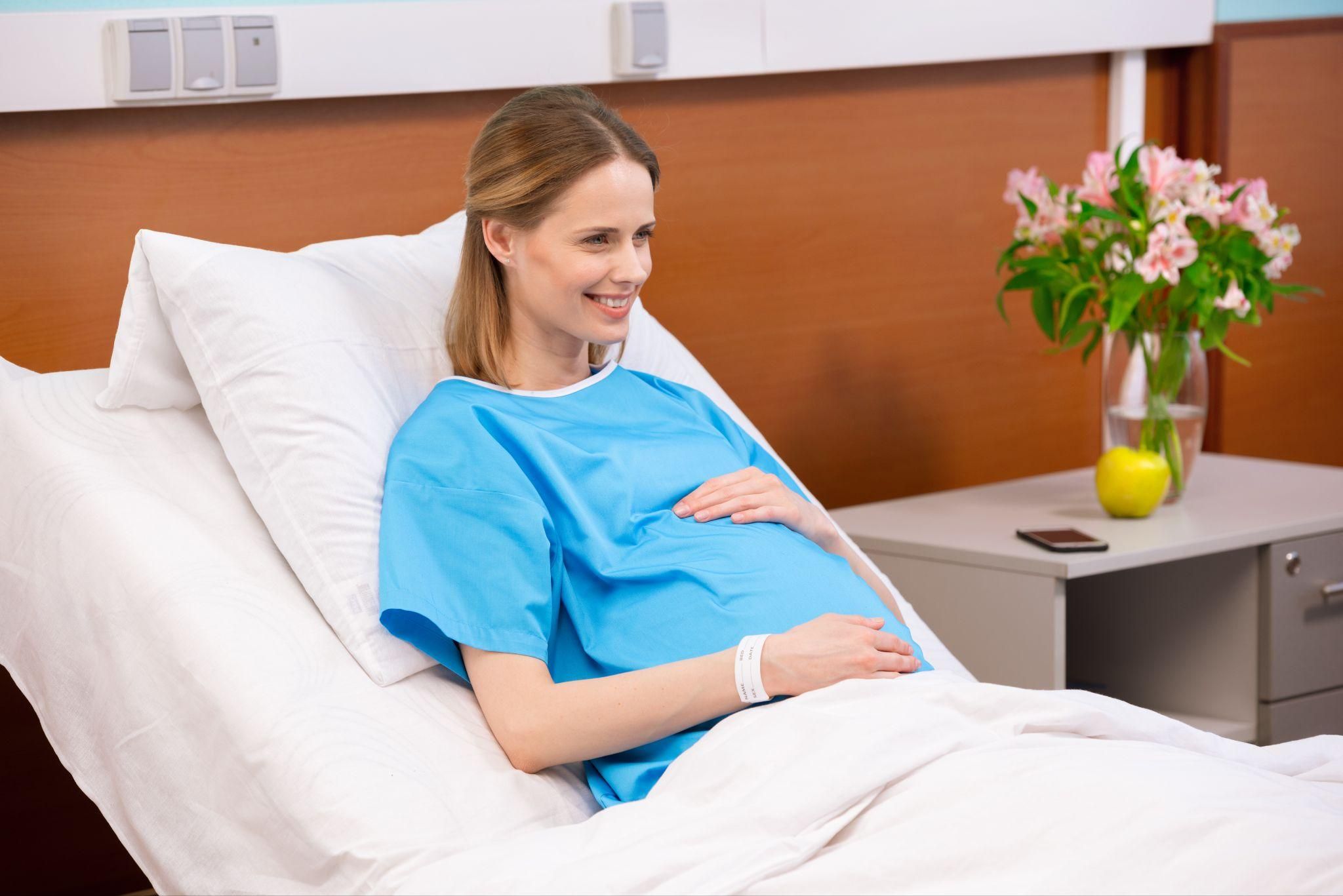 A pregnant woman undergoing her first antenatal scan.