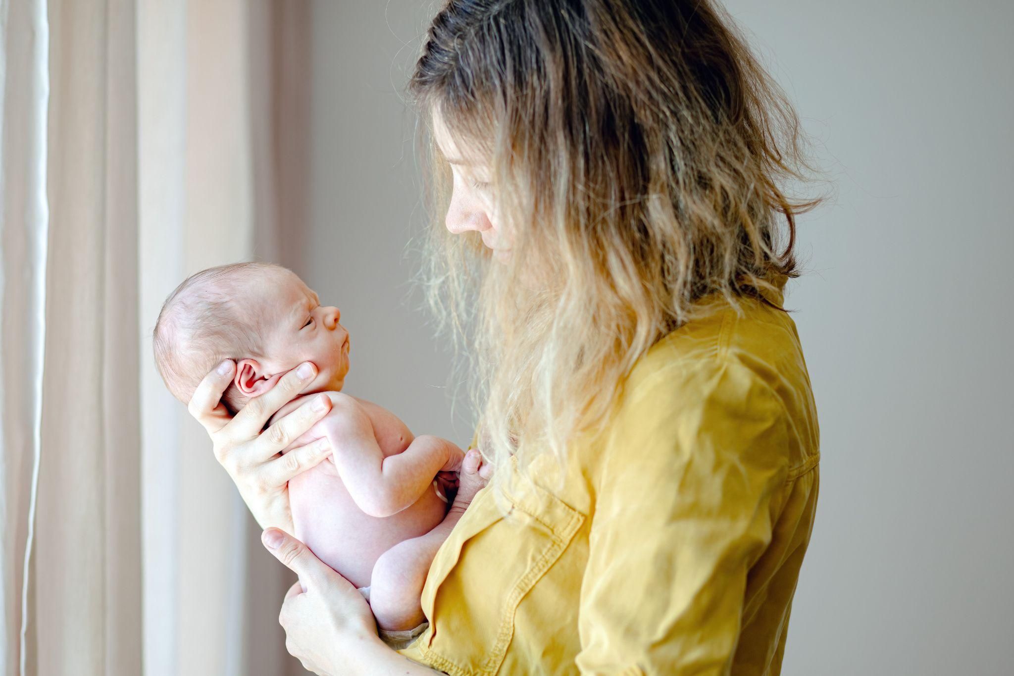 Expectant mother enjoying a relaxing prenatal yoga session to prepare for a private and empowering vaginal birth experience.