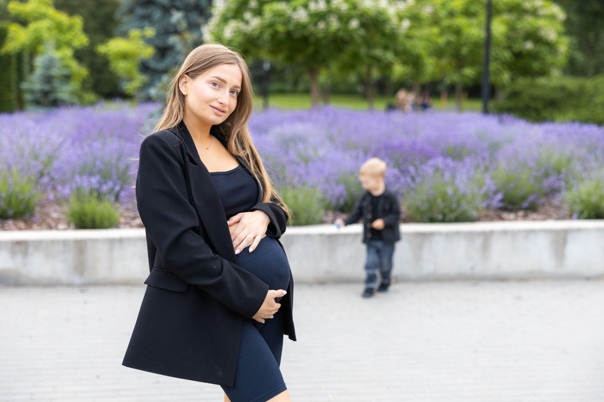 A group of expectant parents, including single mothers, engaging in a workshop.