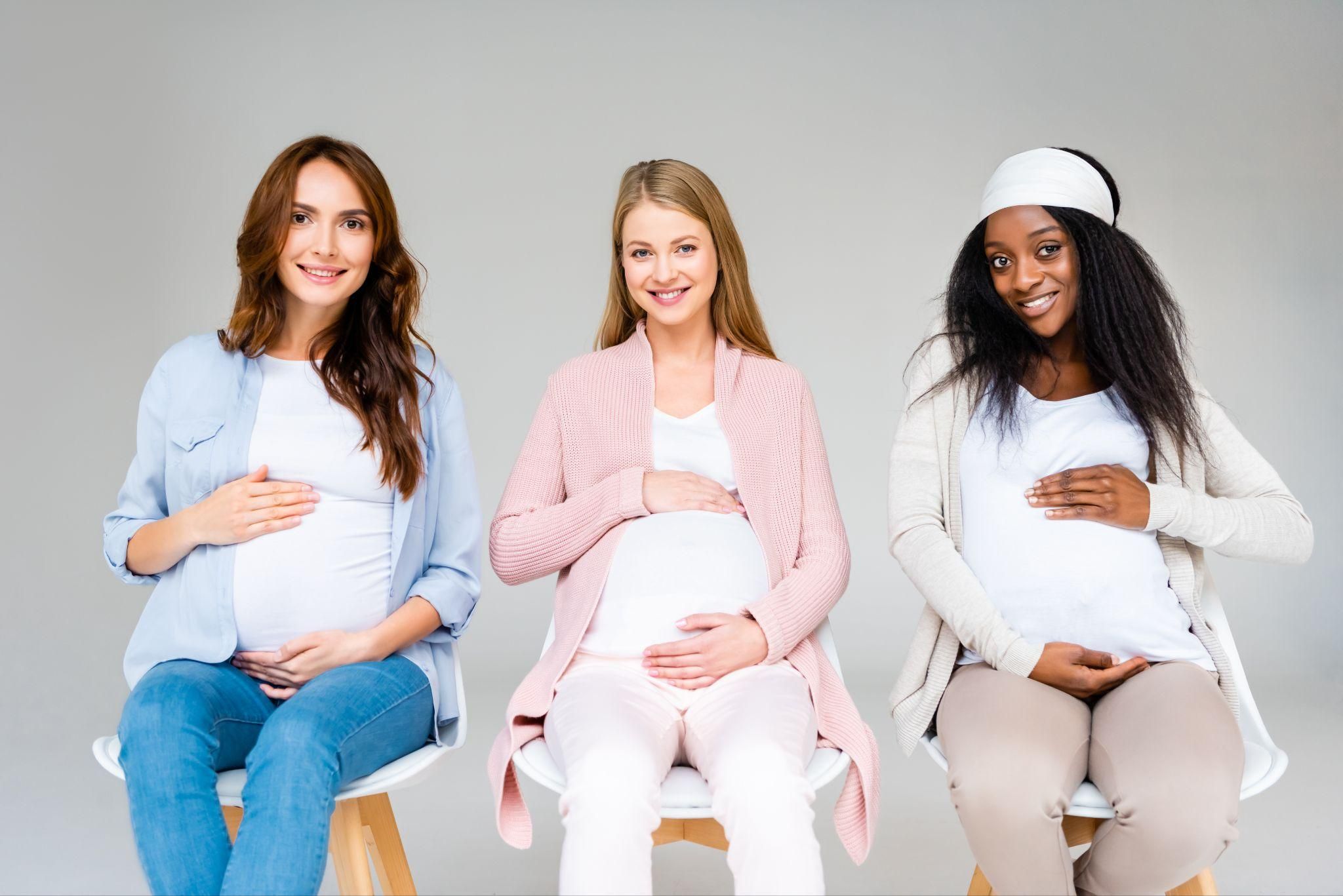 A group of expectant parents bonding during antenatal education.