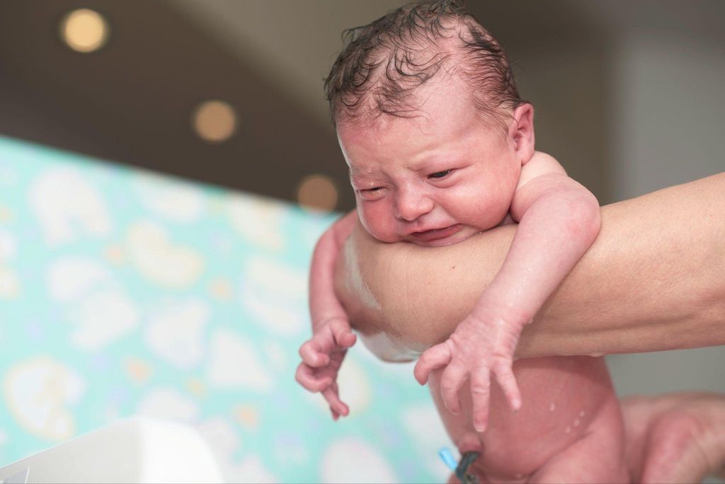 A collection of baby baths, including ergonomic, foldable, and playful designs.