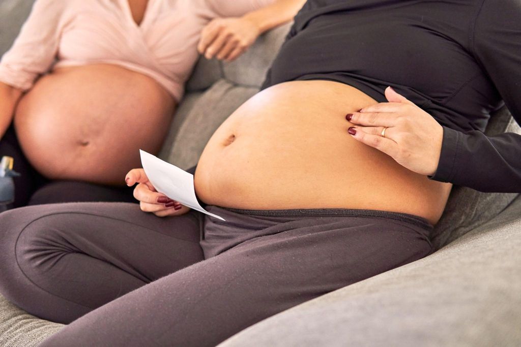 Expectant parents engaging in discussion at an NCT antenatal session.