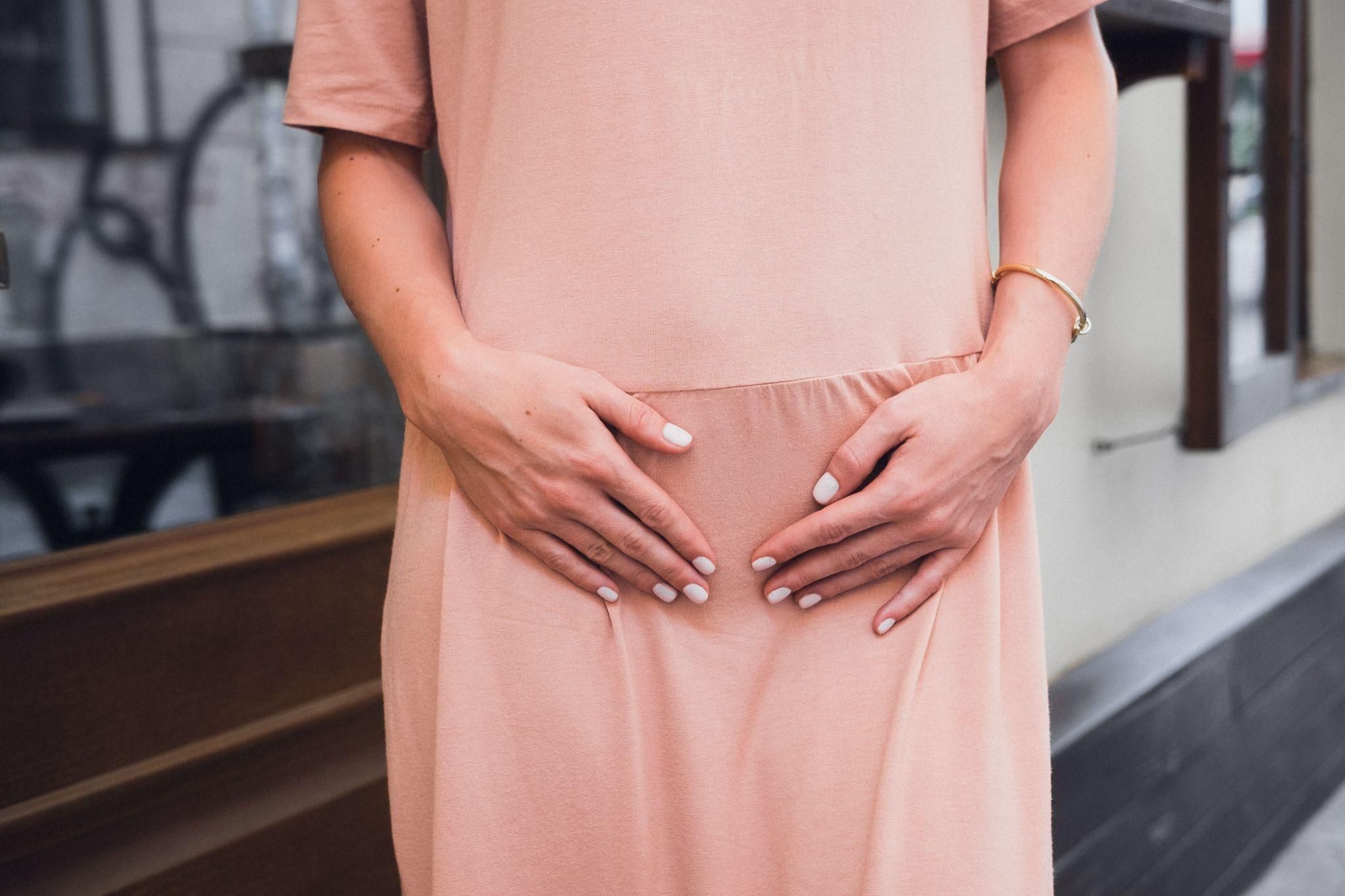 A midwife will perform an antenatal checkup on this pregnant woman at a clinic.