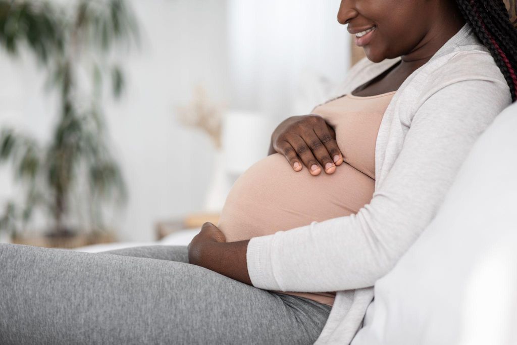 Expectant mother enjoying music and bonding with her baby in the womb.