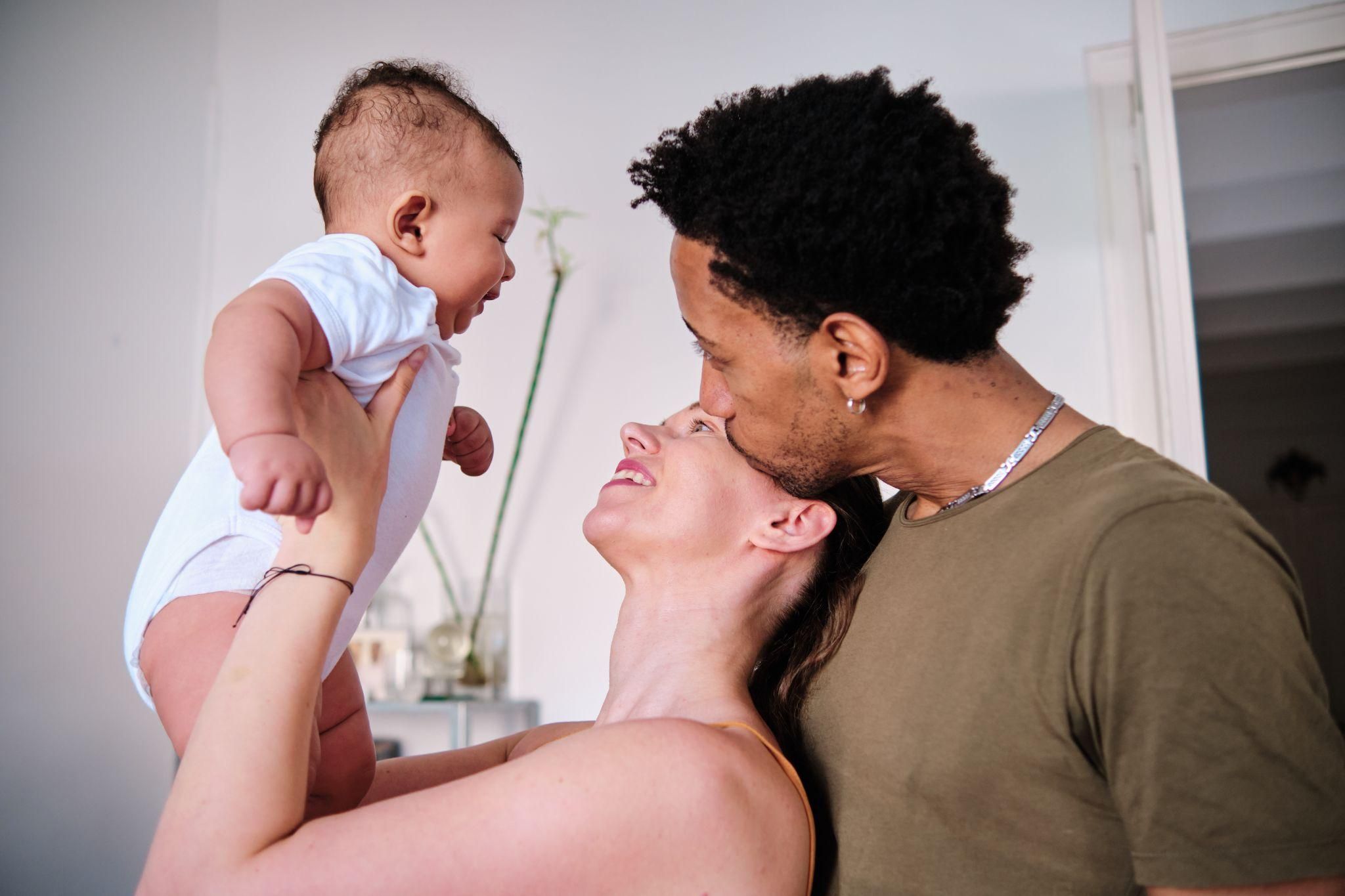 A mother and her newborn, showing the balance of joy and challenges in early motherhood.