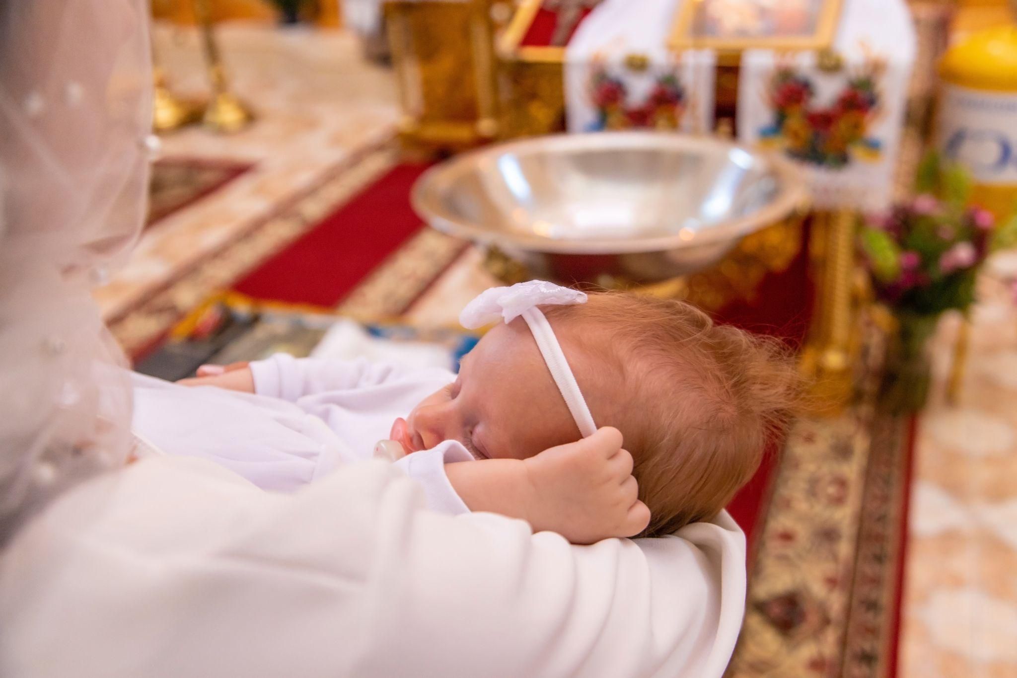 New mother wearing a stylish yet comfortable outfit to her baby’s baptism while recovering from a C-section.