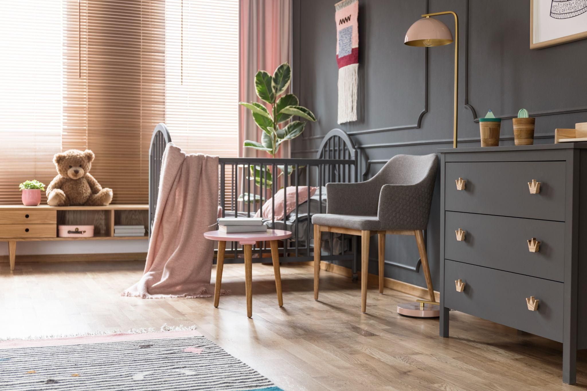 A sustainable baby nursery with natural wood furniture and organic textiles.