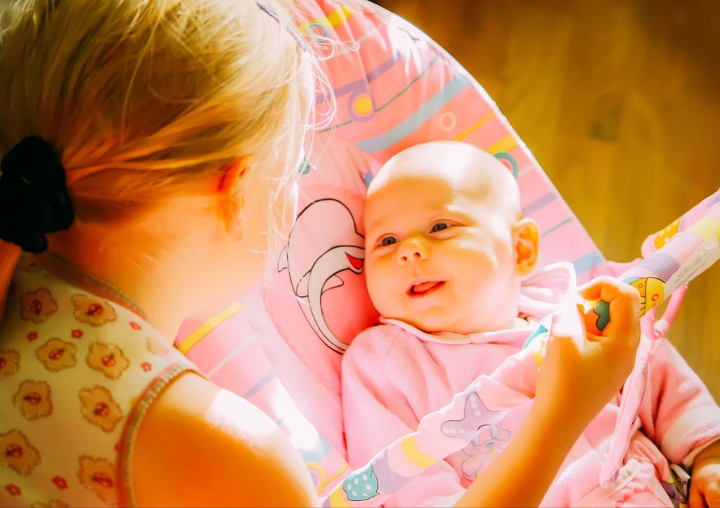 Baby bouncers displayed in a nursery setting, featuring top-rated designs for babies under one.