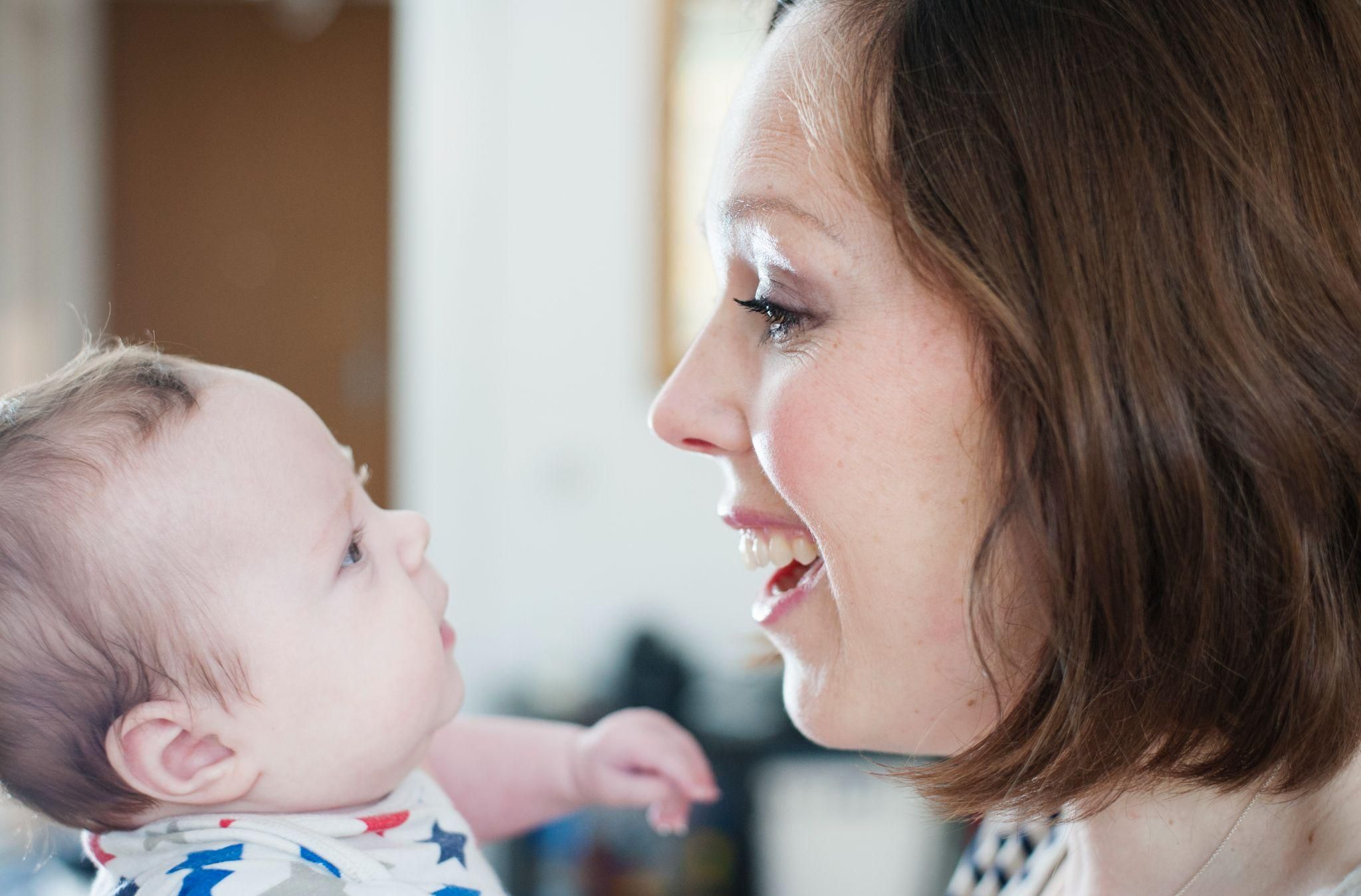 A confident and strong mother enjoying a moment with her baby.