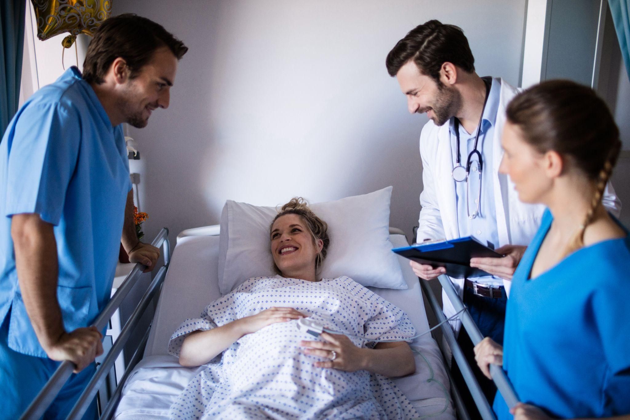 A team of doctors helping during a complicated birth.