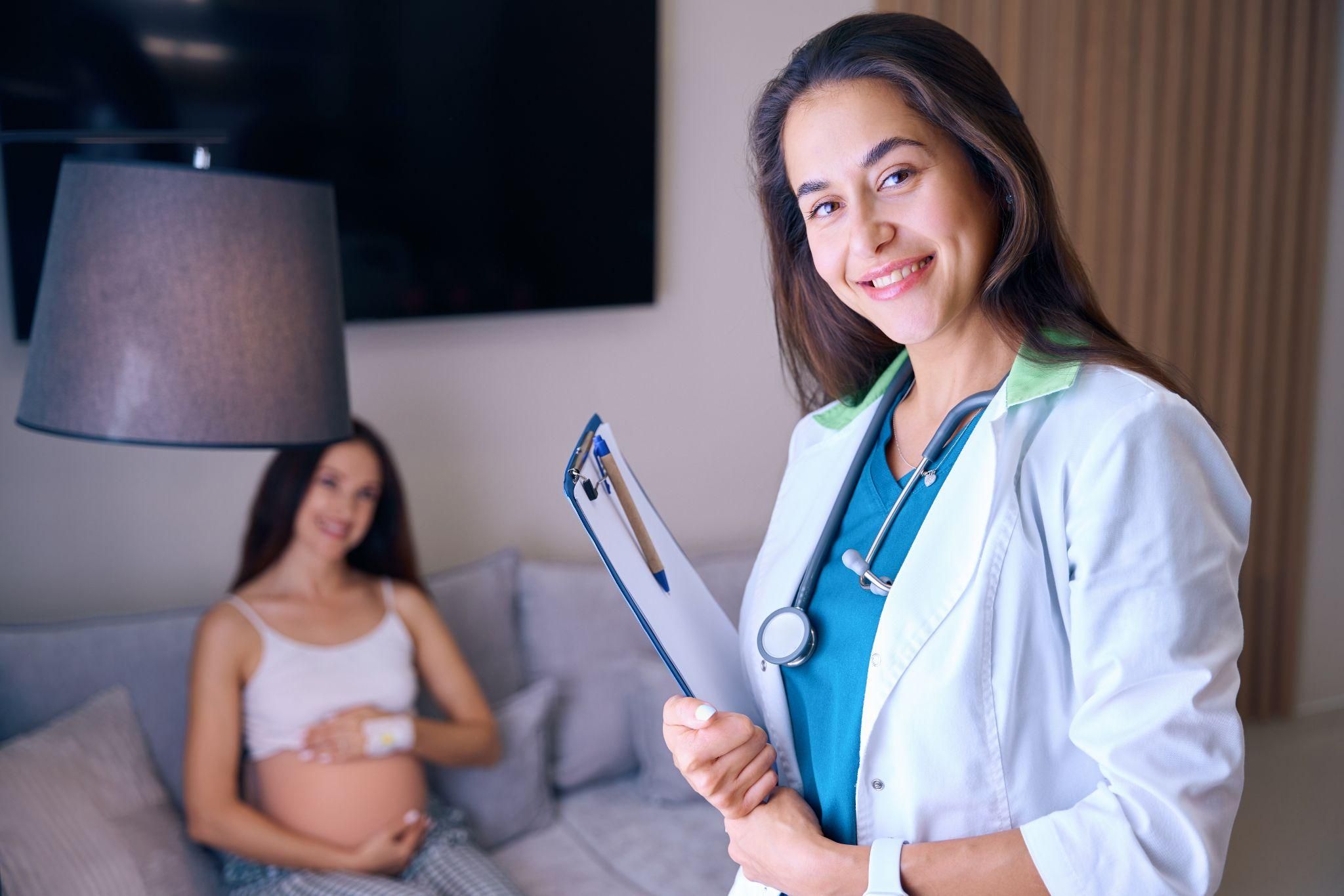 Expectant mother attending an antenatal consultation for a prenatal checkup.