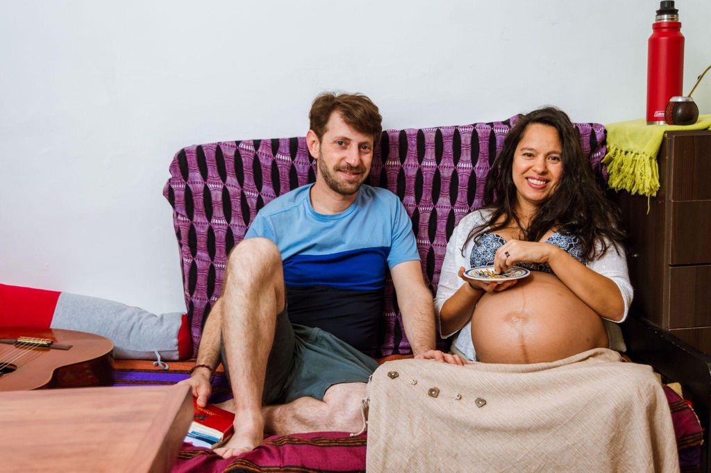 Multicultural family attending an antenatal appointment.