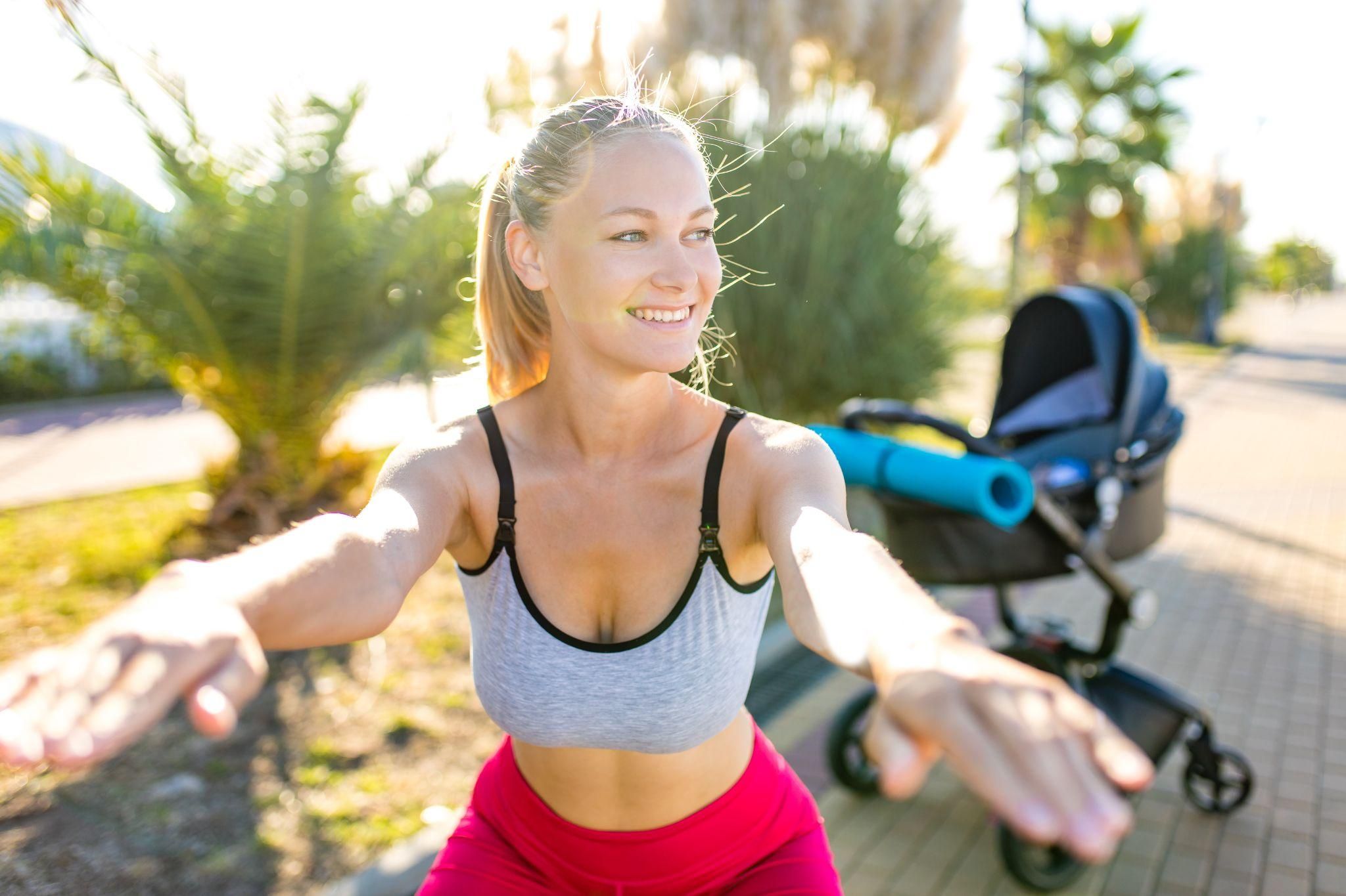 New mum embracing her post-baby body with confidence and positivity.