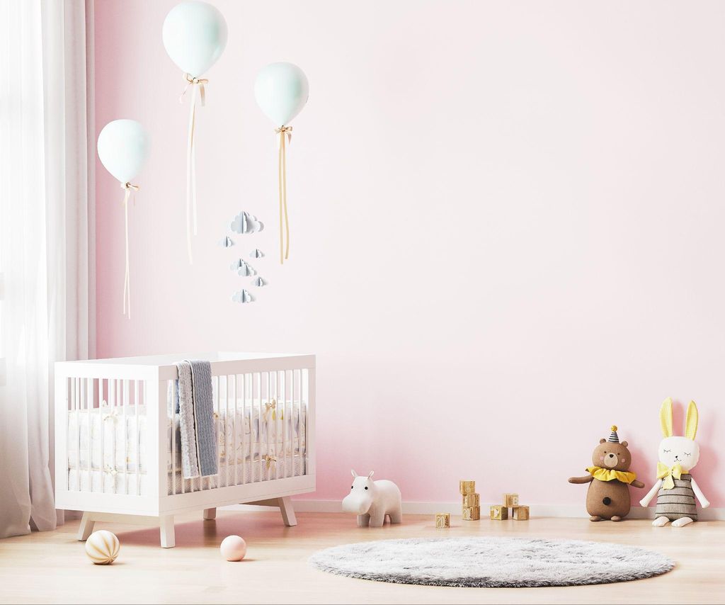 A cosy baby room designed with affordable and creative decor ideas.