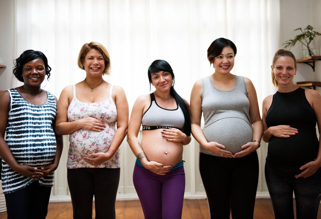 Women from different cultural backgrounds participating in a group antenatal session.