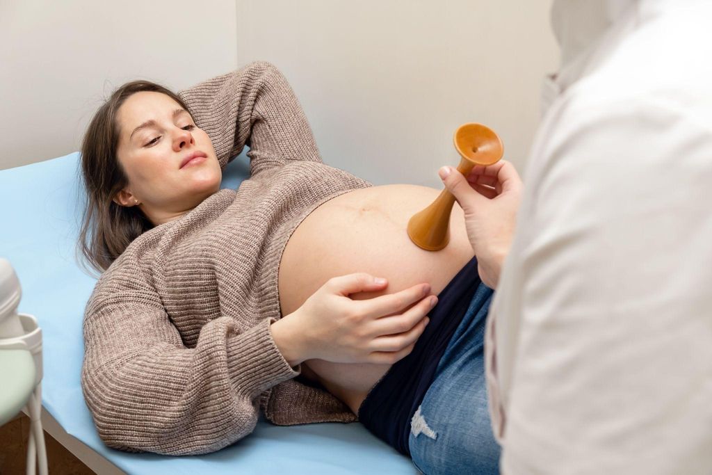 Expectant mother using natural labour pain relief techniques.