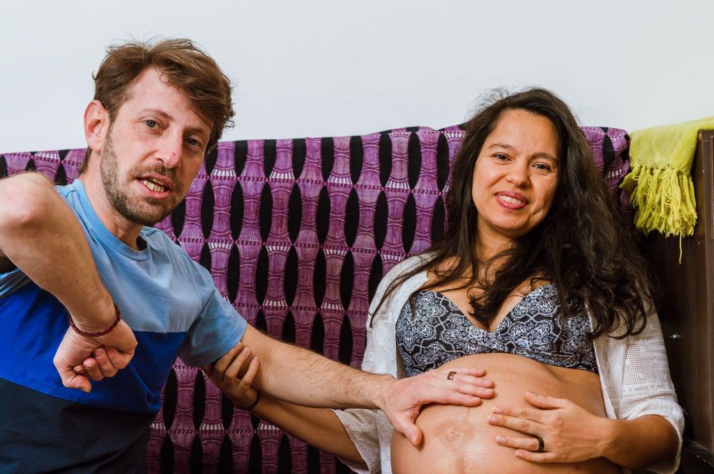 Expectant mother practising antenatal yoga to prepare for motherhood and reduce stress.