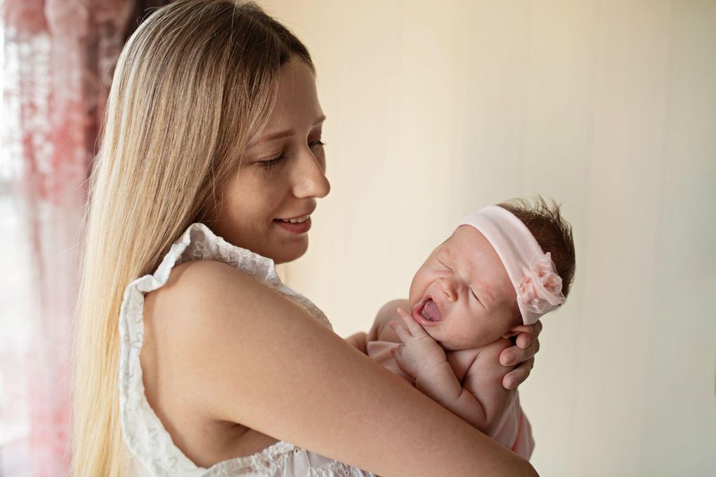 A calendar showcasing different birth months, with symbols of success such as trophies and stars surrounding it.