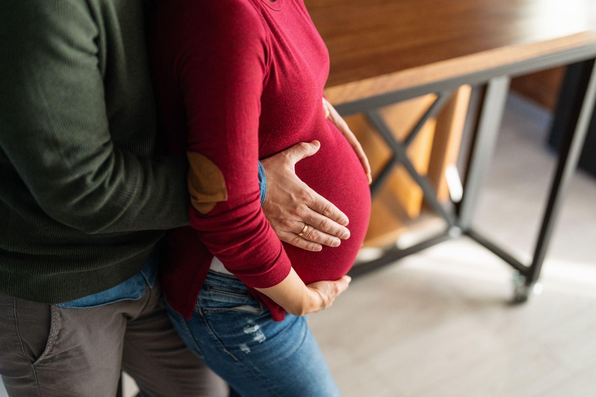 A small group of parents attending antenatal classes, learning about childbirth and baby care.