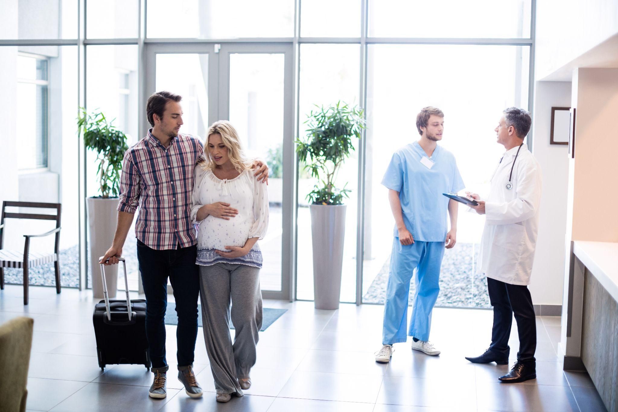 Expectant couple preparing to go to the hospital as labour begins.